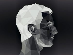 Profile of young man in origami style